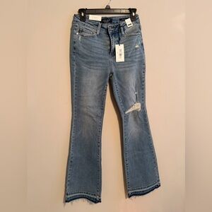 Judy Blue Mid Rise Medium
Wash Distressed Released Hem Bootcut